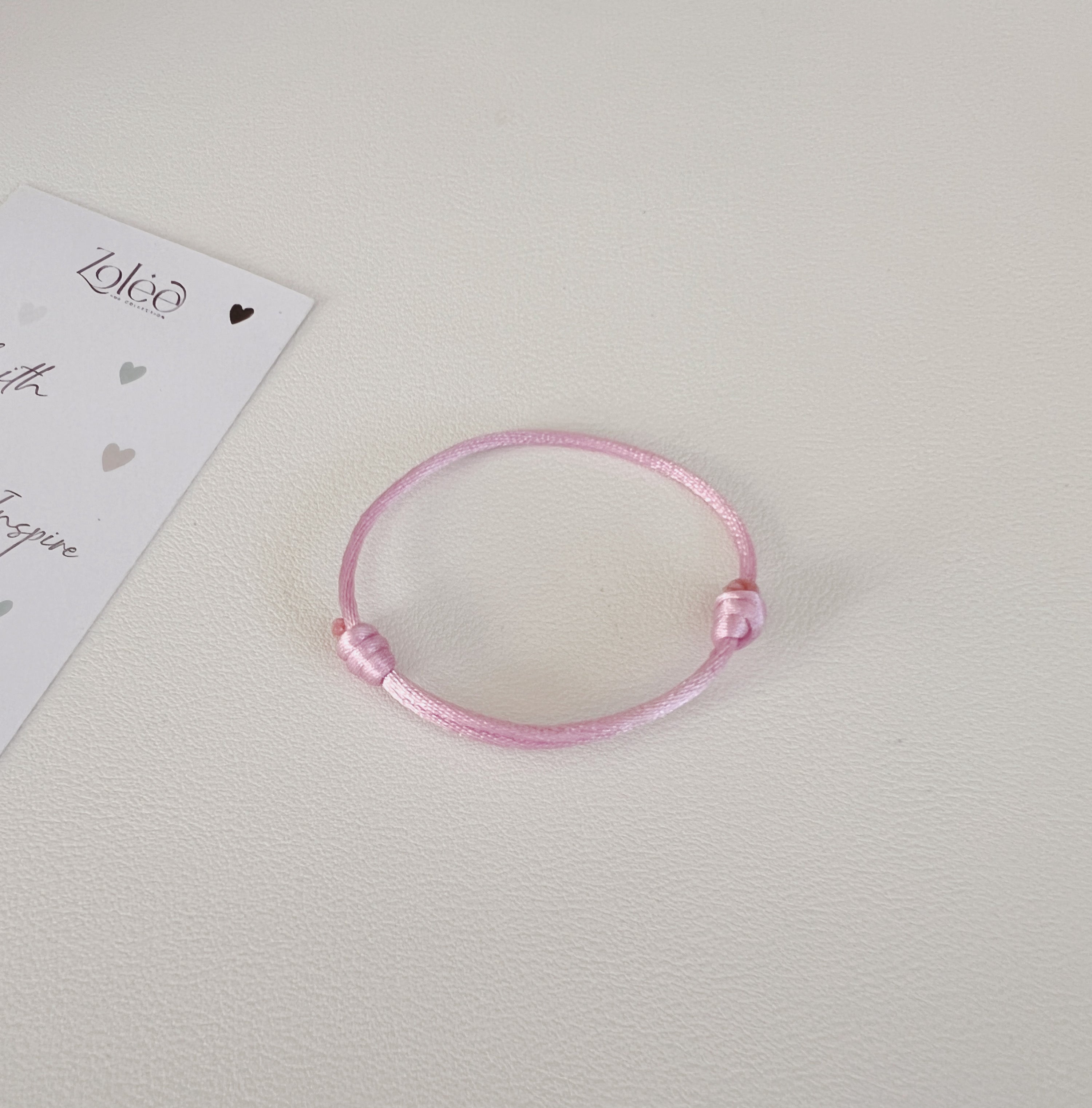 Pink cord bracelet