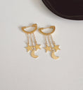 Load image into Gallery viewer, Moon & Stars dangle earrings
