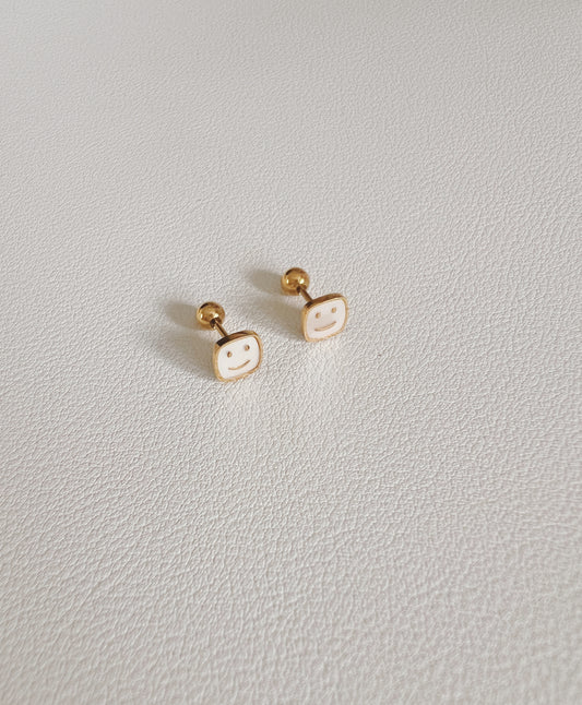 Happy  face  studs 2